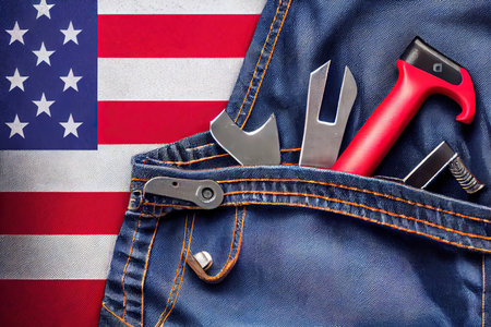 Set of tools and american flag in jeans pocket. labor day background concept. Generative Aiの素材