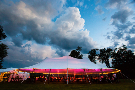 event tent at dusk with cloudsの写真素材