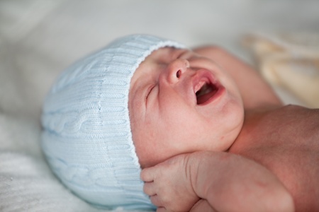Baby Boy Waking From Sleepの写真素材