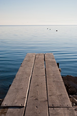 A wooden pier by the Ohrid Lake in Macedoniaの写真素材