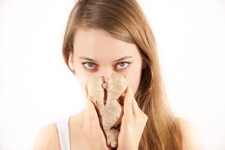 A young woman with a gingerの写真素材