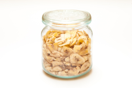 A jar filled with dry bananasの写真素材