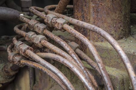 Hydraulic pipes of an old machine.の写真素材