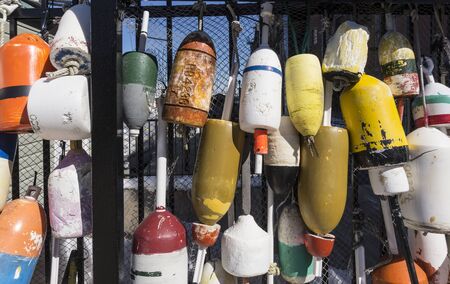 Fishing buyos on a pier.の写真素材