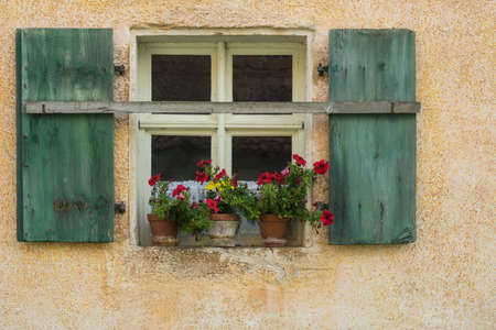 window of a historic farm buildingの写真素材