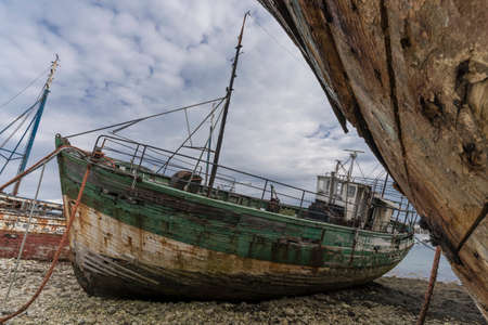 shipwreck in a french port on the atlantic coastの写真素材