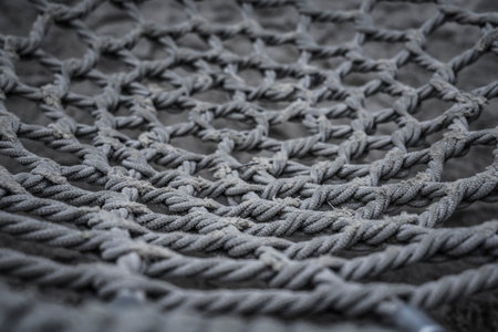 Children swing rope network pattern.