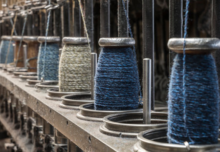 string spools of a historic weaving machine
