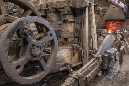 Historic machinery in a blacksmiths workshop.