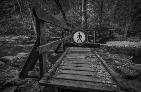 passage route over a little riverの写真素材