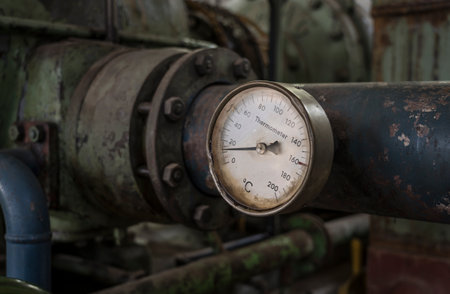 pipelines and measuring device on a historic machineの写真素材