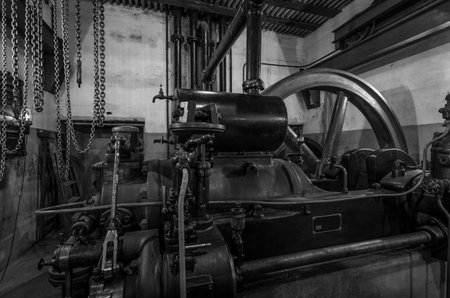 detail of a historic industrial compressor machineの写真素材