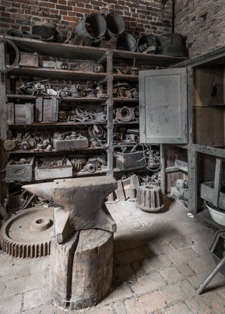 Historic anvil in a abandoned workshop.