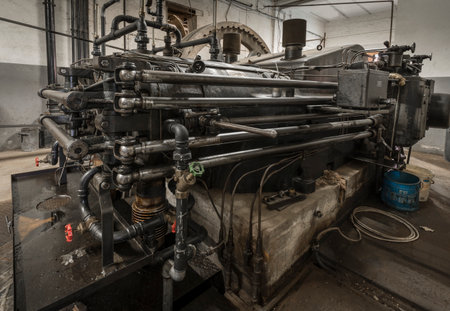 Old stationary diesel engine in a factory.