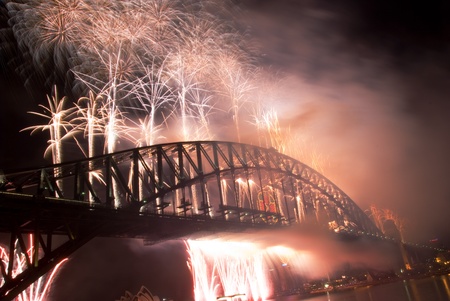 Sparkling New Year Eve nye Fireworks in Sydney Harbour Sky Line At Night, NSW, Australia, Oceania. The Sydney harbour bridge and sydney opera house sparkling in the night. Colourful surface. Night sceneのeditorial素材
