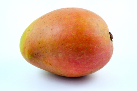 a ripe mango isolated on white background
