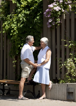 mature couple holding handsの写真素材