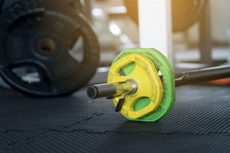 fitness club with equipment, gym for exercise and weight training, body transfomationの写真素材