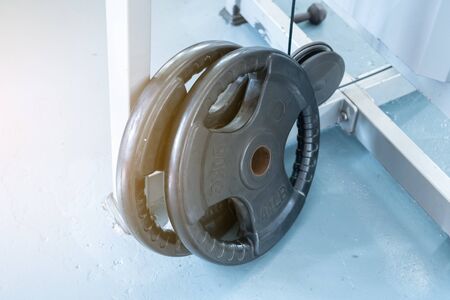 fitness club with equipment, gym for exercise and weight training, body transfomationの写真素材