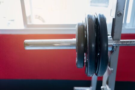 fitness club with equipment, gym for exercise and weight training, body transfomationの写真素材
