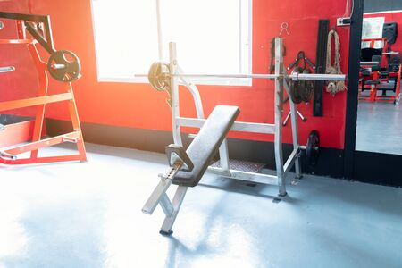 fitness club with equipment, gym for exercise and weight training, body transfomationの写真素材