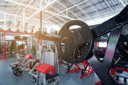 fitness club with equipment, gym for exercise and weight training, body transfomationの写真素材
