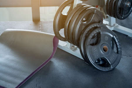 fitness club with equipment, gym for exercise and weight training, body transfomationの写真素材