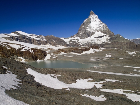 Matterhorn and a cute lake in sunny dayの写真素材