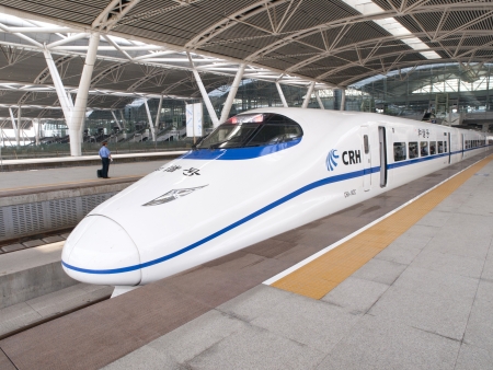 GUANGZHOU, CHINA - JULY 8: Modern train waits at platform on July 8, 2010 in Guangzhou station,...