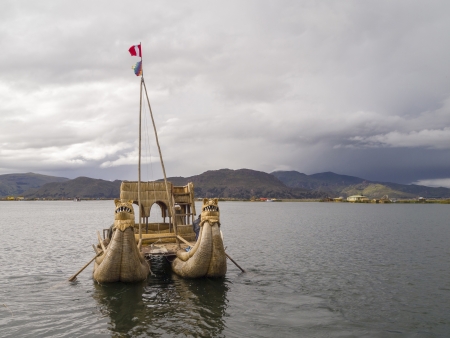 Old traditional floating reed boat in Titicaca lake, Puno, Peru 