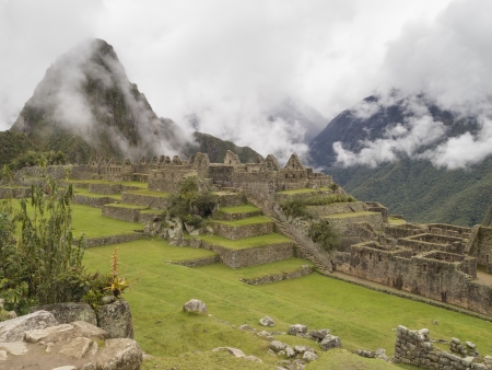 Machu Picchu - Mysterious city and archaeological site of pre-Columbian civilization of the Incas on the Andes cordillera mountains archeology near Cusco, Peru の写真素材