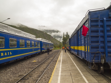 OLLANTAYTAMBO, PERU - MAR 15  Blue train at Ollantaytambo Station on Mar 15, 2011 in Ollantaytambo, Peru  Ollantaytambo Station is an important halfway station between Cuzco and Machu Picchu のeditorial素材