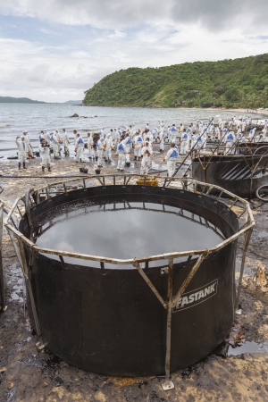 RAYONG, THAILAND - JULY 31  Big tank that contained crude oil from cleaning operations due to crude oil spill accident on Ao Prao Beach in Samet island on July 31, 2013 in Rayong,Thailandのeditorial素材