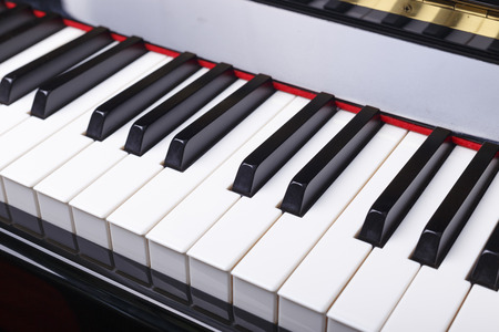 Close up of Piano keys, selective focus with shallow depth of field.の写真素材
