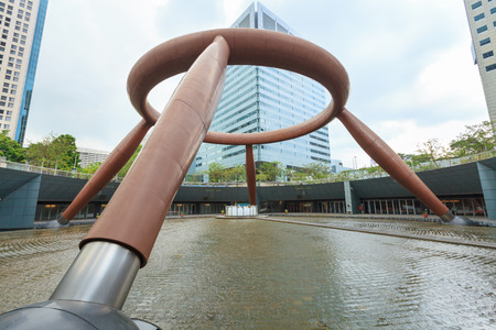 SINGAPORE - OCT 13: The Fountain of Wealth on October 13, 2012. Built in 1995, it is is the largest fountain in the world located in the commercial complex of Suntec City, Singapore.のeditorial素材