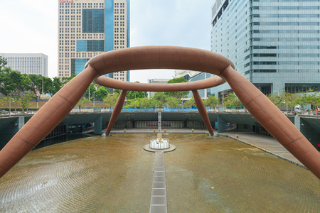 SINGAPORE - OCT 13: The Fountain of Wealth on October 13, 2012. Built in 1995, it is is the largest fountain in the world located in the commercial complex of Suntec City, Singapore.のeditorial素材