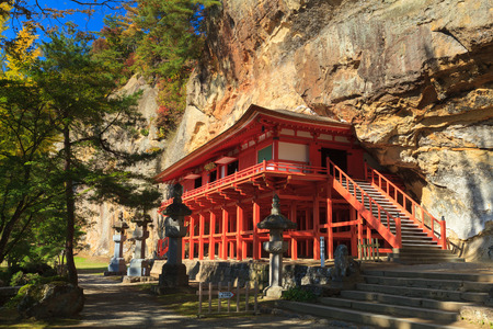 IWATE, JAPAN -OCT 27, 2012: Takkoku no Iwaya Bishamondo Temple, the National Historic site of Japan in Iwate prefecture. This temple built in the rock wall of a cliff about 1,200 years ago.のeditorial素材