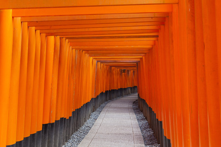 KYOTO, JAPAN -NOV 27, 2012: Tunnel of Torii gate at Fushimi Inari Taisha Shrine, Kyoto, Japan. Fushimi Inari is an important Shinto shrine in southern Kyoto.のeditorial素材