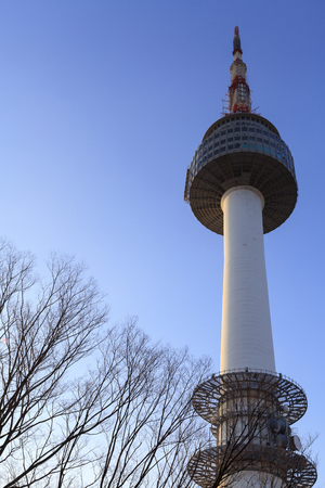 SEOUL, SOUTH KOREA - DEC 18, 2012: N Seoul Tower against morning blue sky in Seoul, Korea. Built in 1969,since then, the tower has been landmark and marks the highest point in Seoul.のeditorial素材