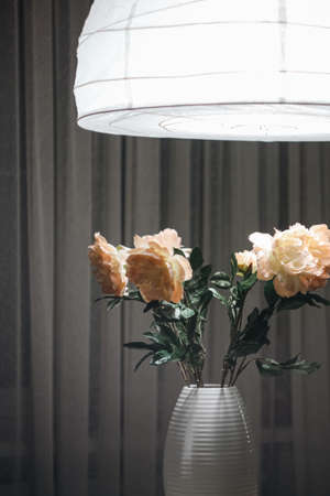 vase with flowers in interiorの写真素材