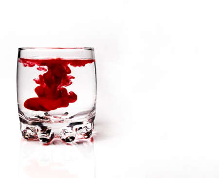 glass of red wine on the white background