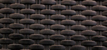 The surface of black braided plastic