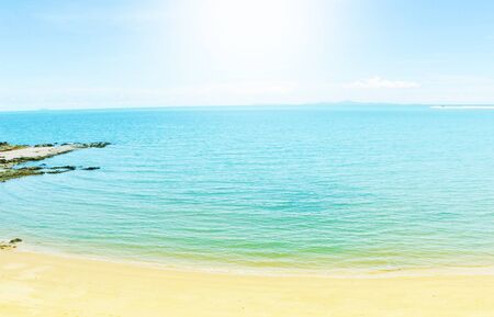 The blue sea and the sky has sunlight.の写真素材