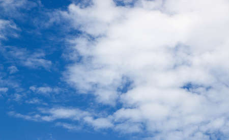 Blue sky and clouds backgroundの写真素材