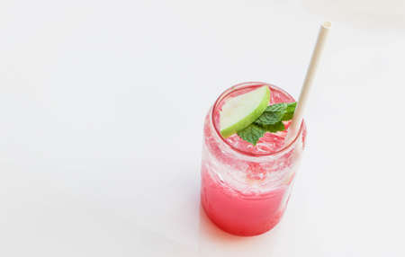 Apple Soda, Pink and Ice in a Glass