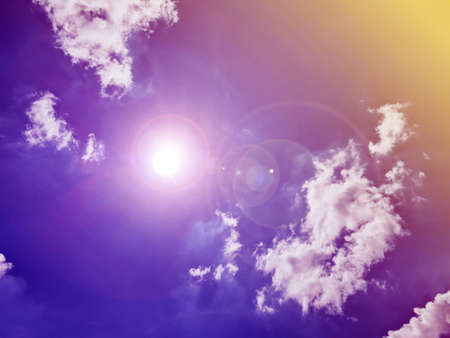 Purple blue sky and the fair rays of the sun shone.の写真素材