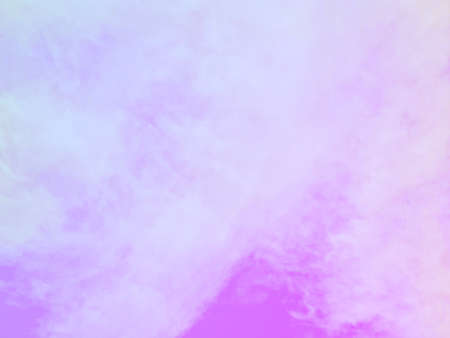 The sky was pink and the clouds streaked like cotton wool.の写真素材