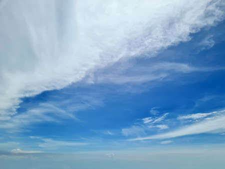 The blue sky and clouds are like bisectors.の写真素材
