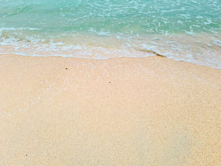 Soft blue waves on a clean sandy beach. travel photosの写真素材