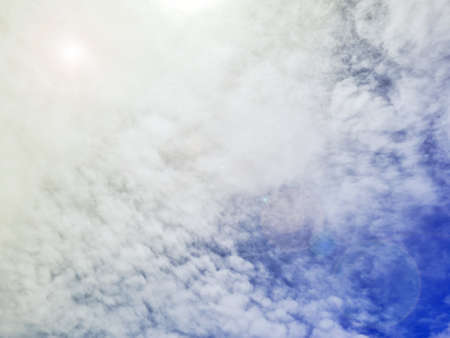 blue sky background with white clouds.